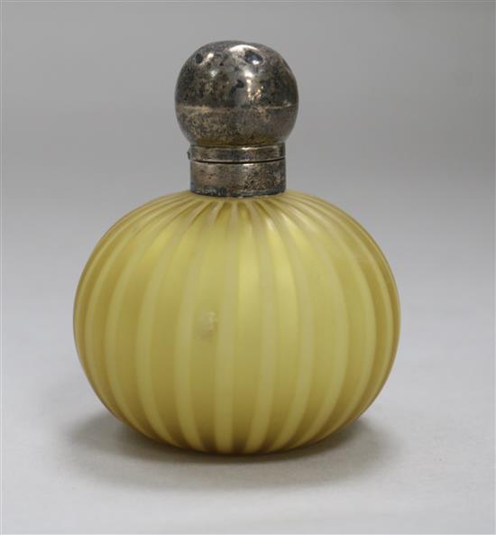 A satin glass and silver scent bottle